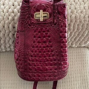Brahmin-Embossed Backpack - Rich pomagranate color.